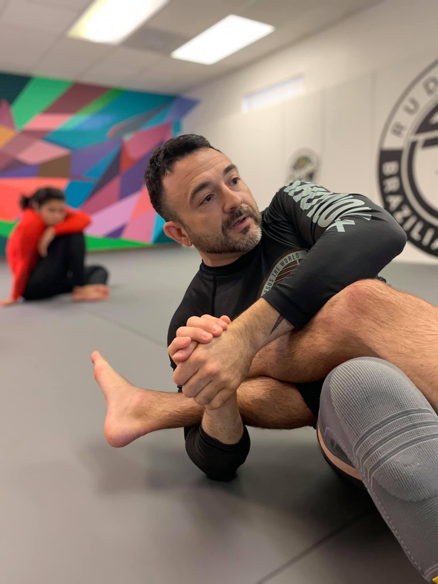 Violet Crown Adults Instructor teaching Jiu Jitsu